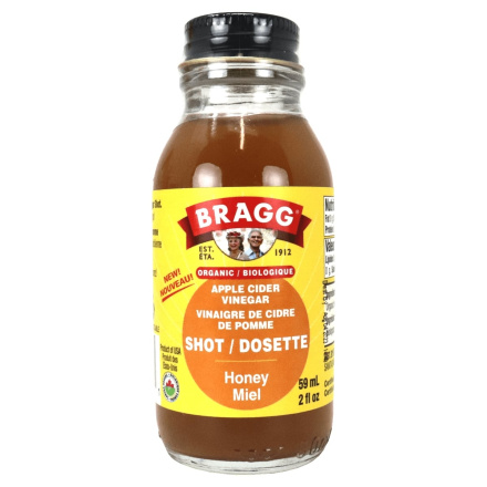 Front of Bragg Organic Apple Cider Vinegar Prebiotic Shot Honey